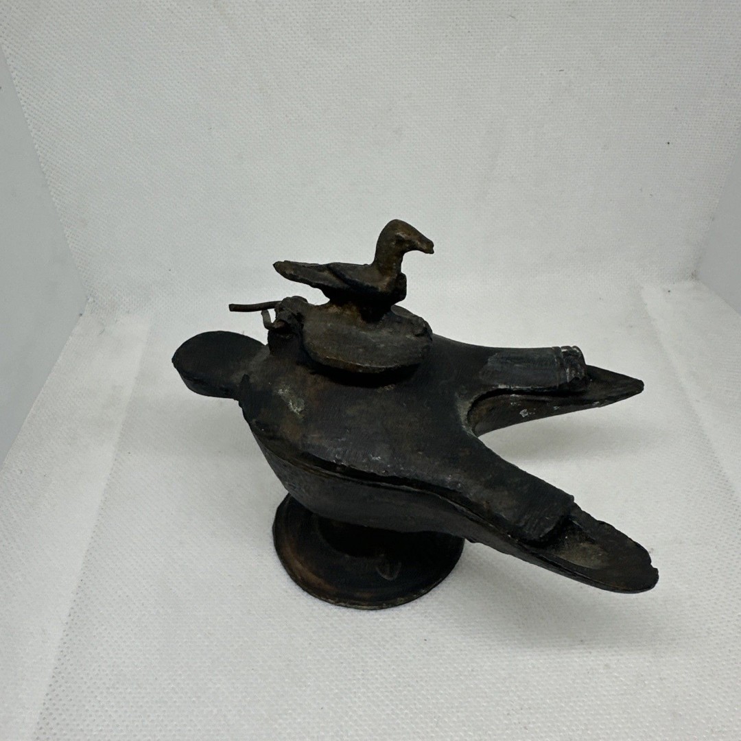 A Seljuk Persian Double Wick bronze oil lamp with trumpet foot 3.75 x4.5
