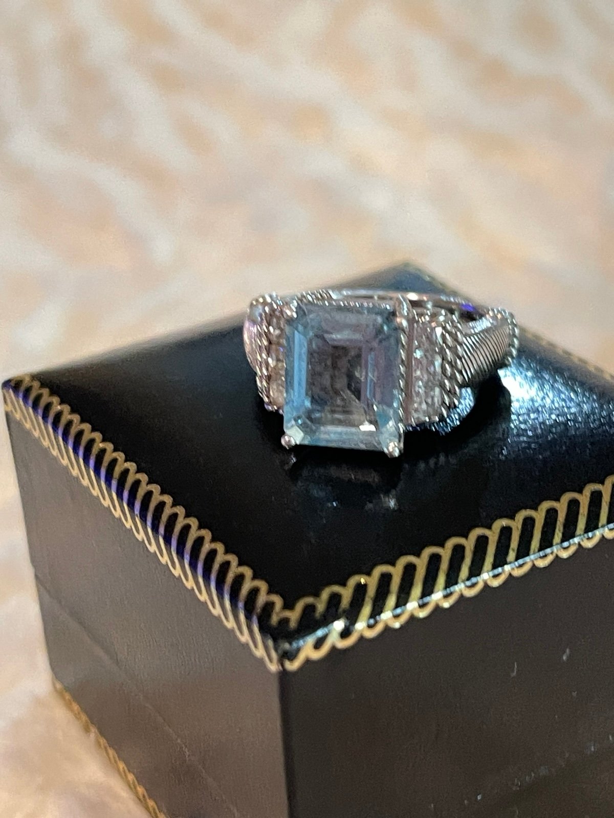 Judith Ripka size 7 ring. Aquamarine emerald cut. 925 sterling silver. Stamped.