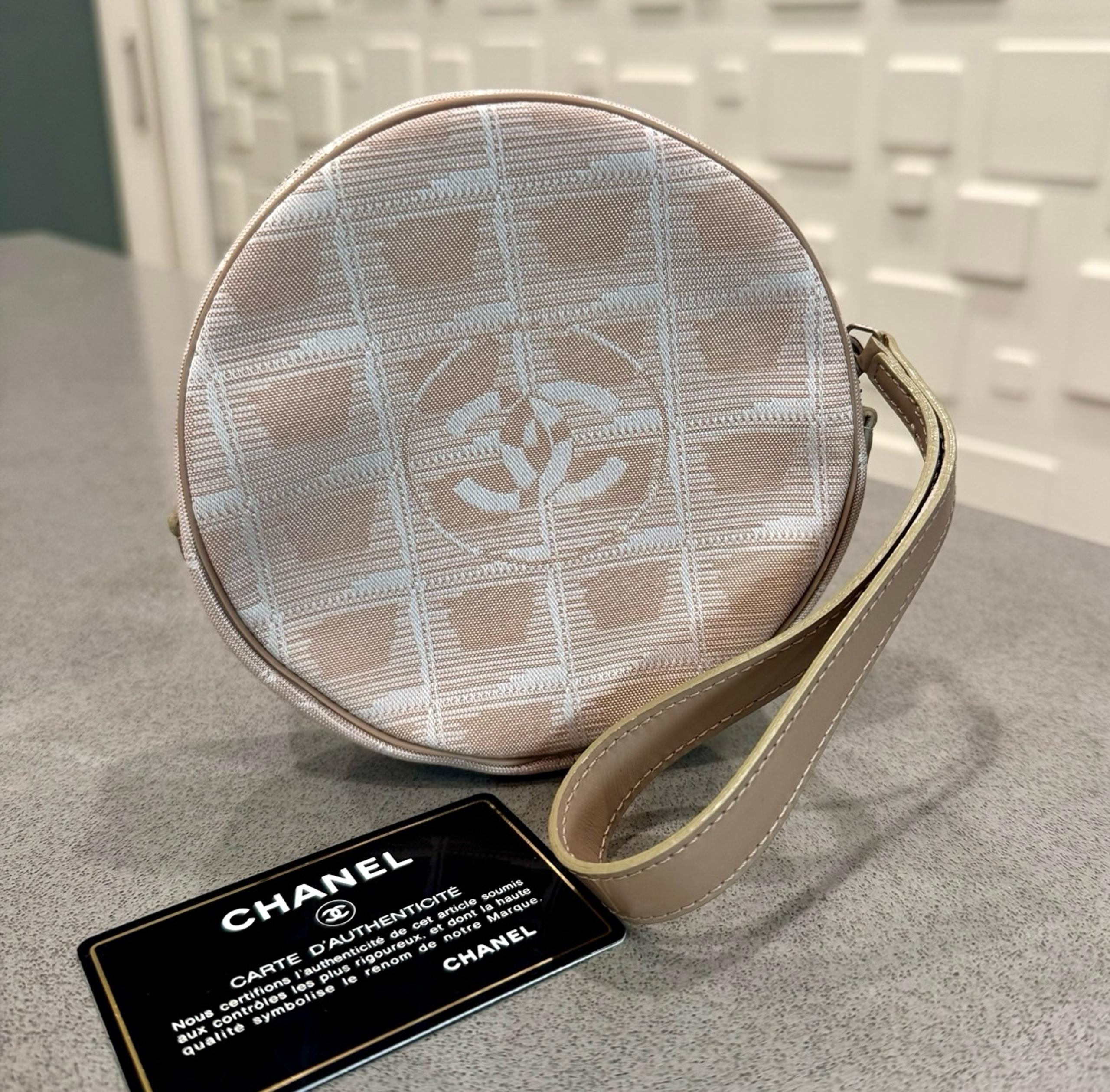 Authentic CHANEL Travel Line Beige Nylon Jacquard Leather Round Pouch Bag