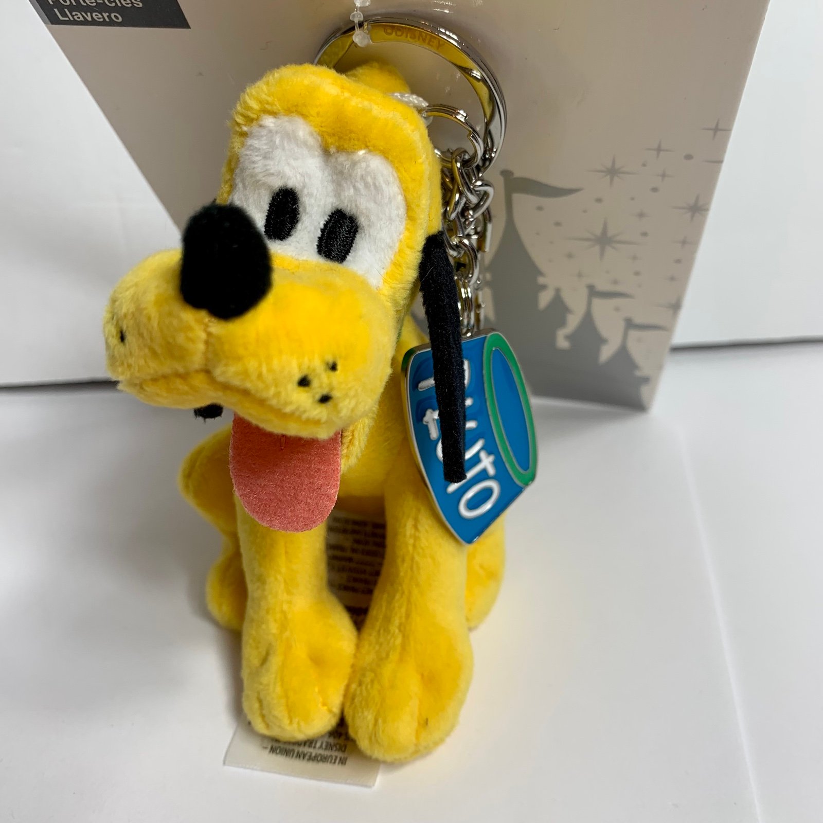 NWT. Disney Parks Pluto plush keychain. Pluto plus is approx 5”H