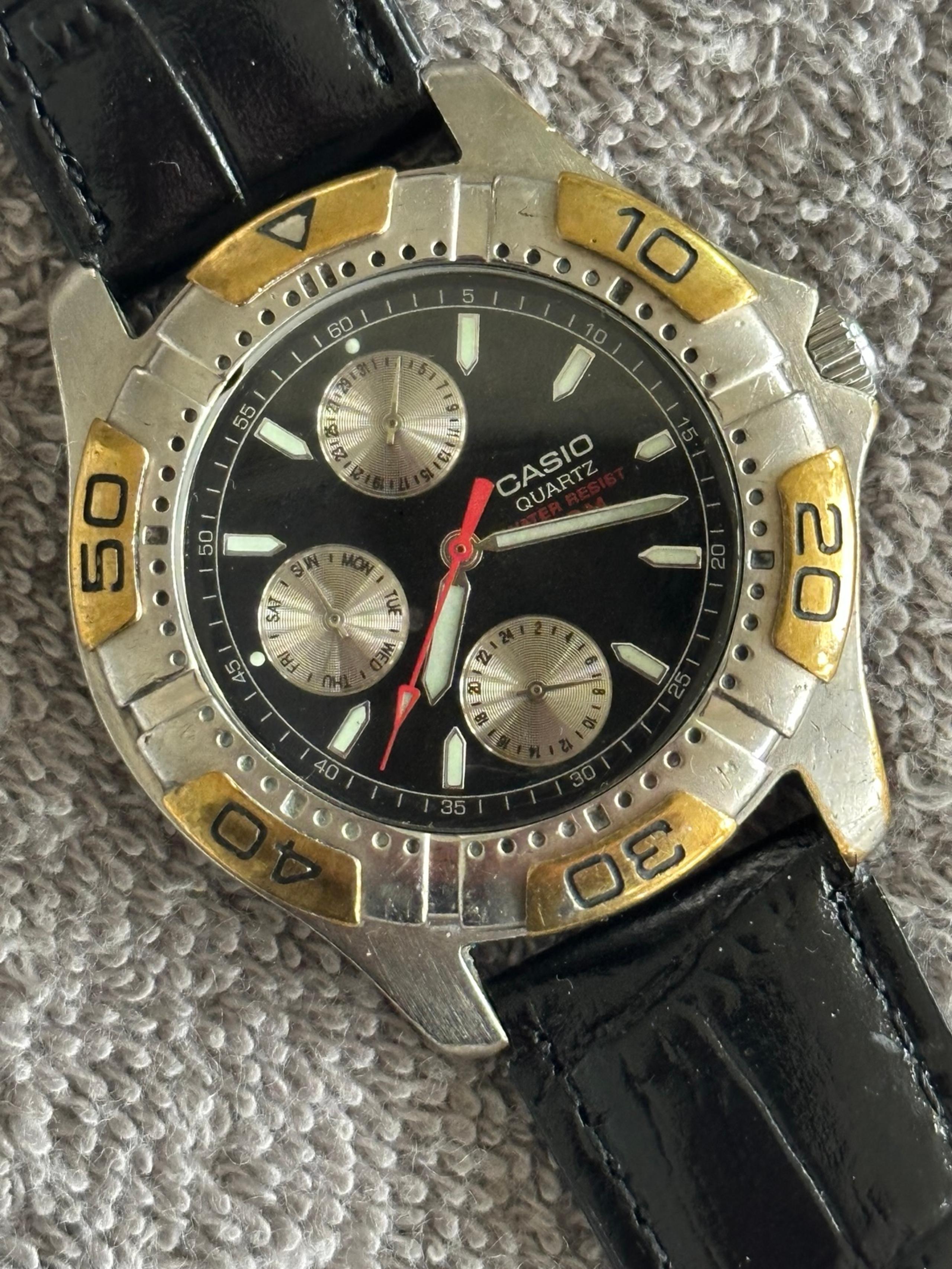Vintage Casio two tones MTD-1023, multi functions watch.