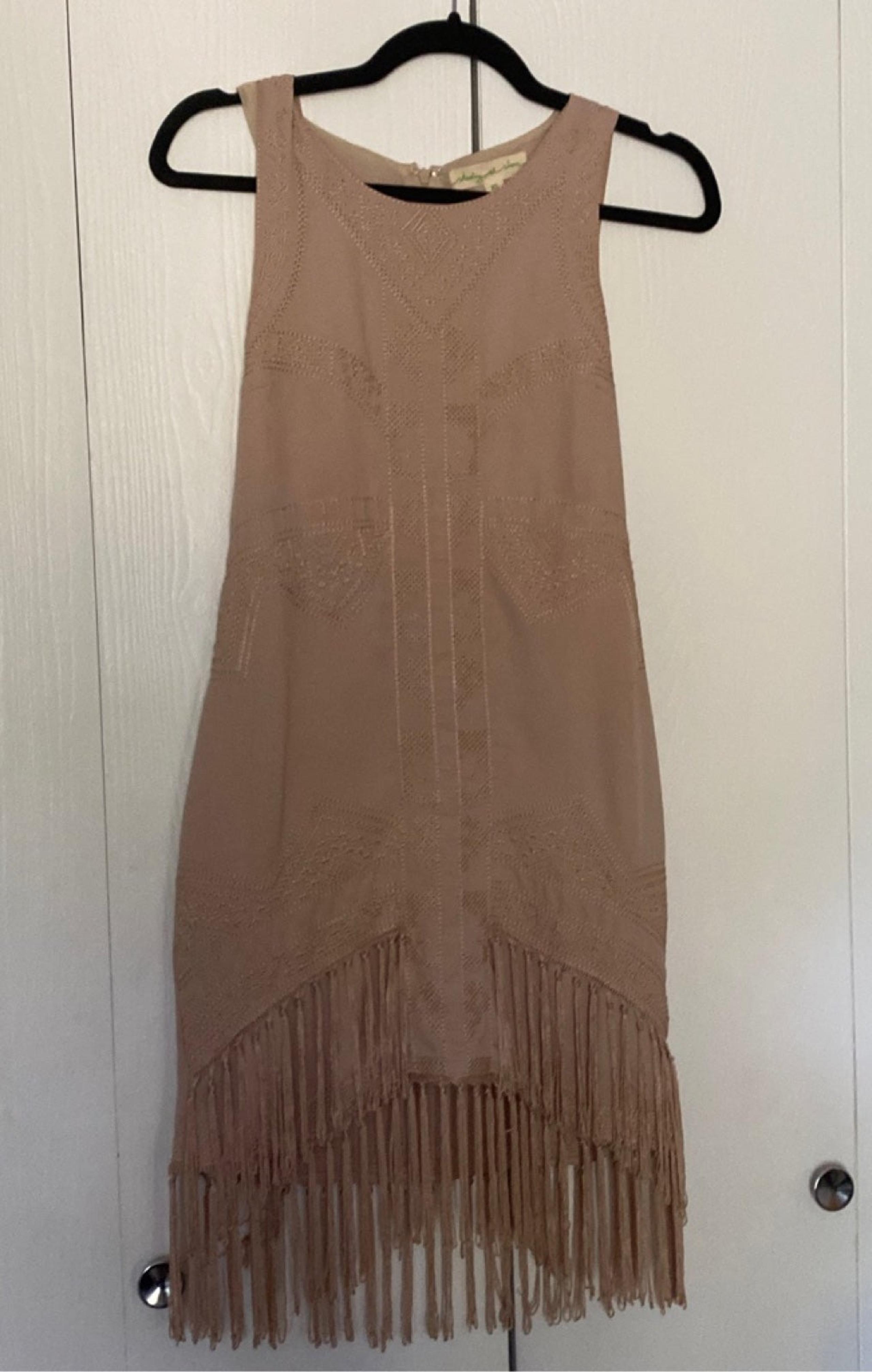 Staring at Stars Tan cocktail dress with fringe detailing