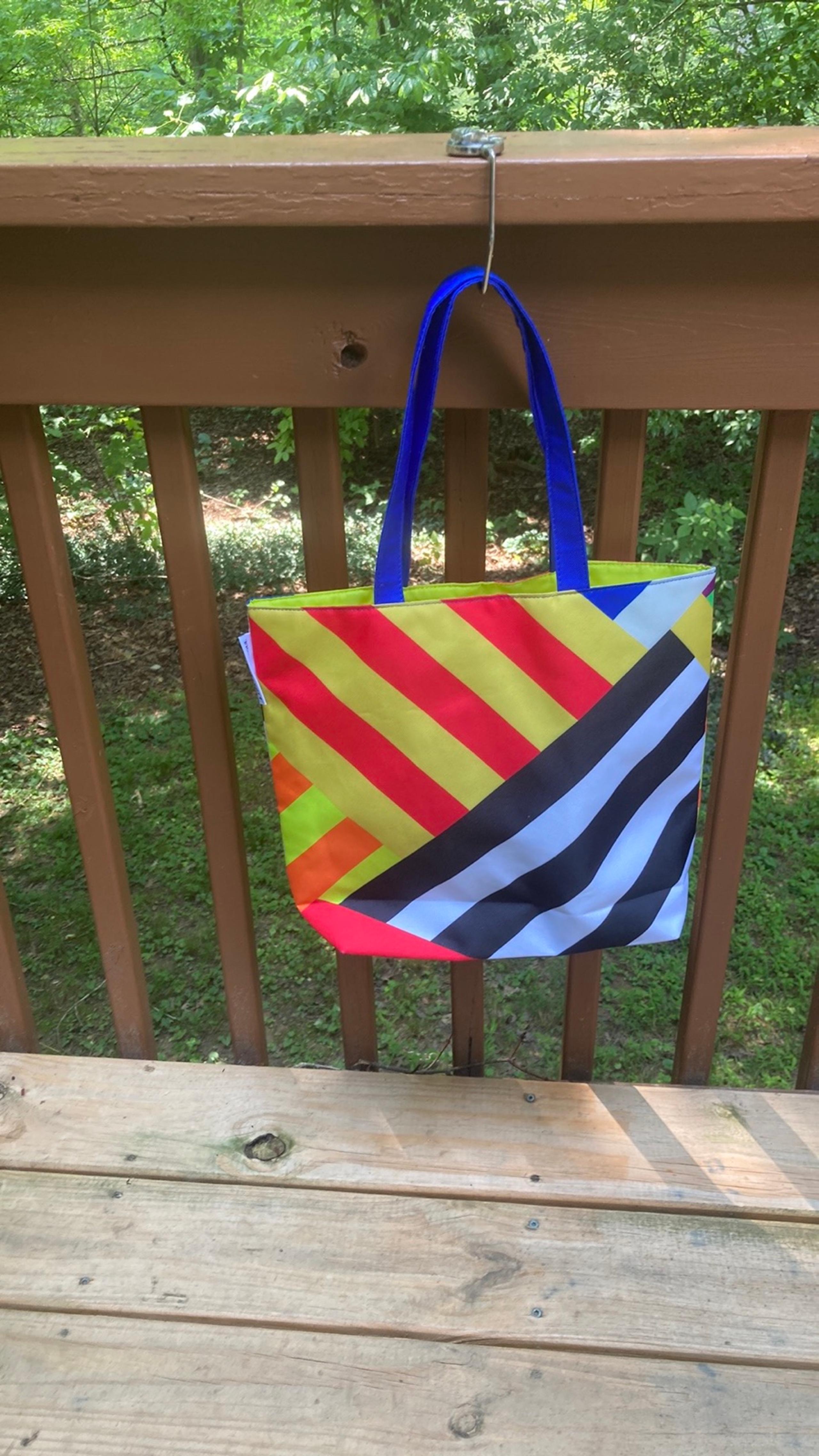 Donald X red and yellow tote bag