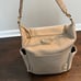 Twelve Little Peek-A-Boo Vegan Leather Convertible Hobo Backpack