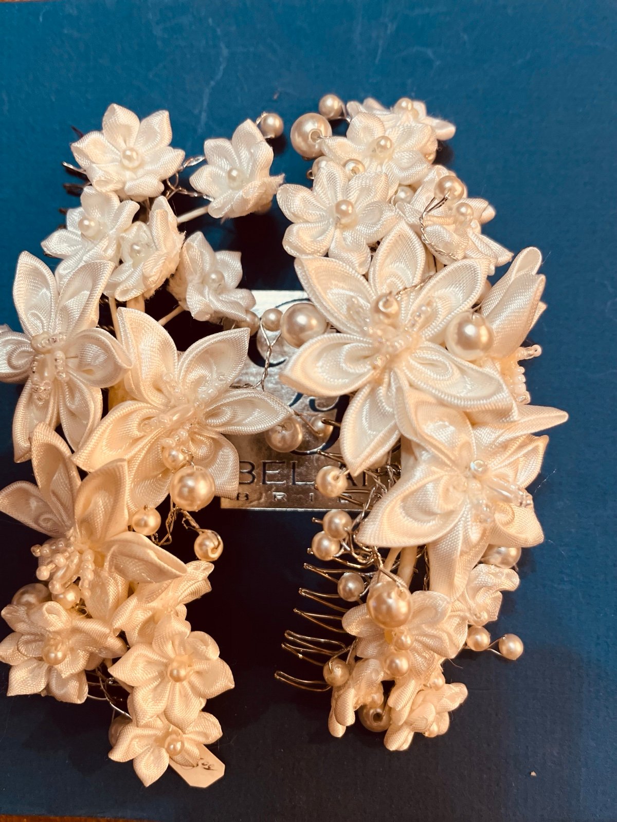 Brand new with tags Bridal hair combs with satin flowers and pearls never worn