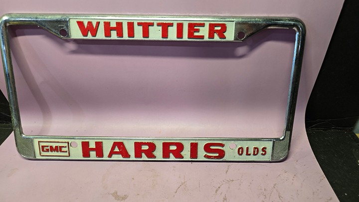 Vintage WHITTIER HARRIS GMC OLDS Oldsmobile Car Dealership License Plate Frame