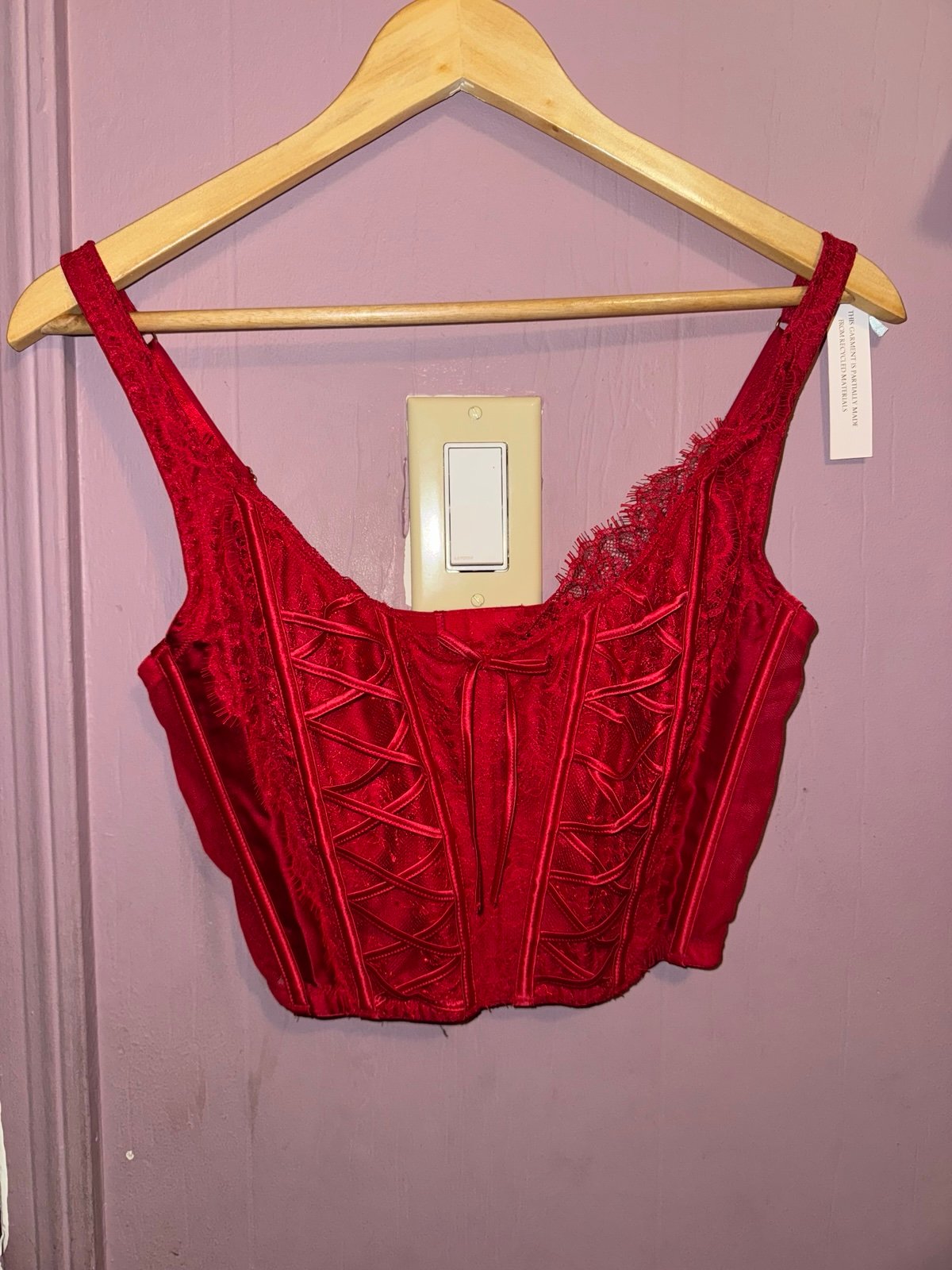 Red bustier top with lace detailing by Victoria’s secret