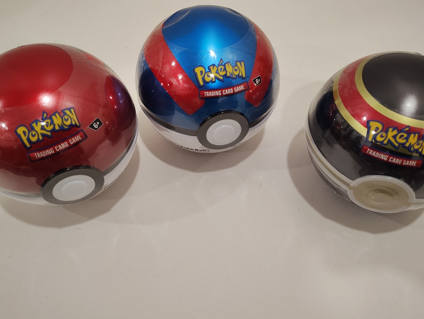 3 brand new pokemon coin and trading cards set