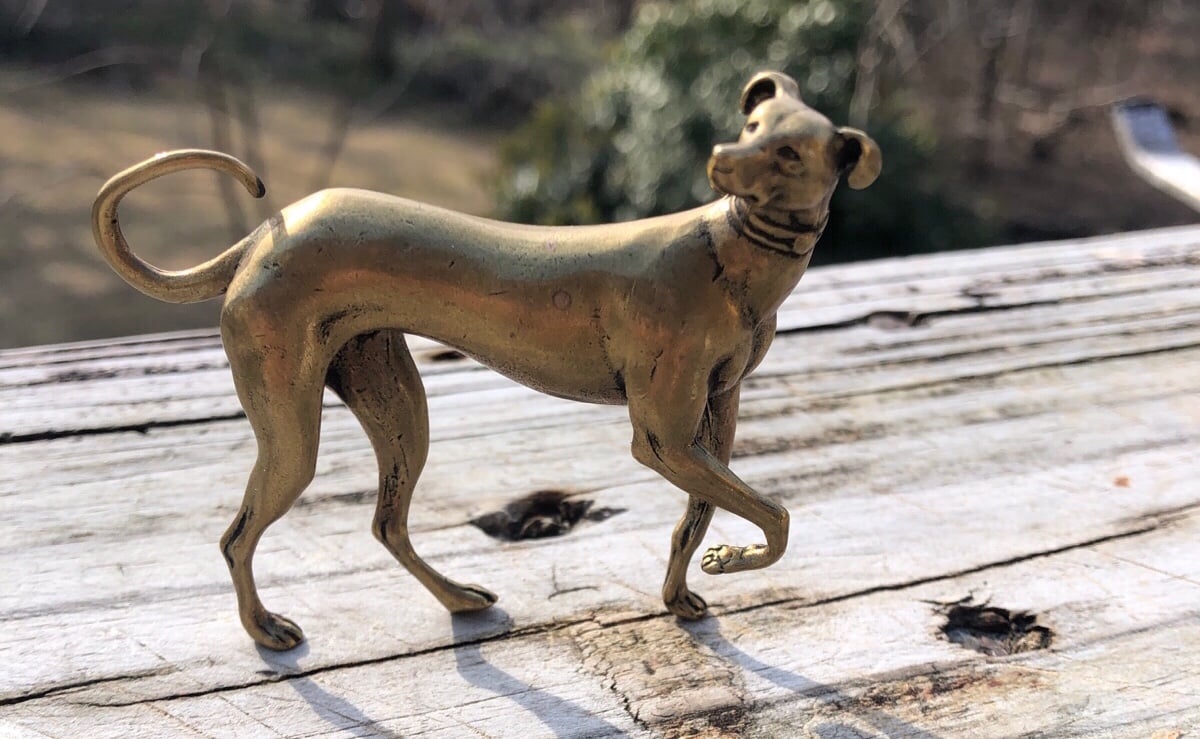 Vintage miniature solid brass detailed dog prancing