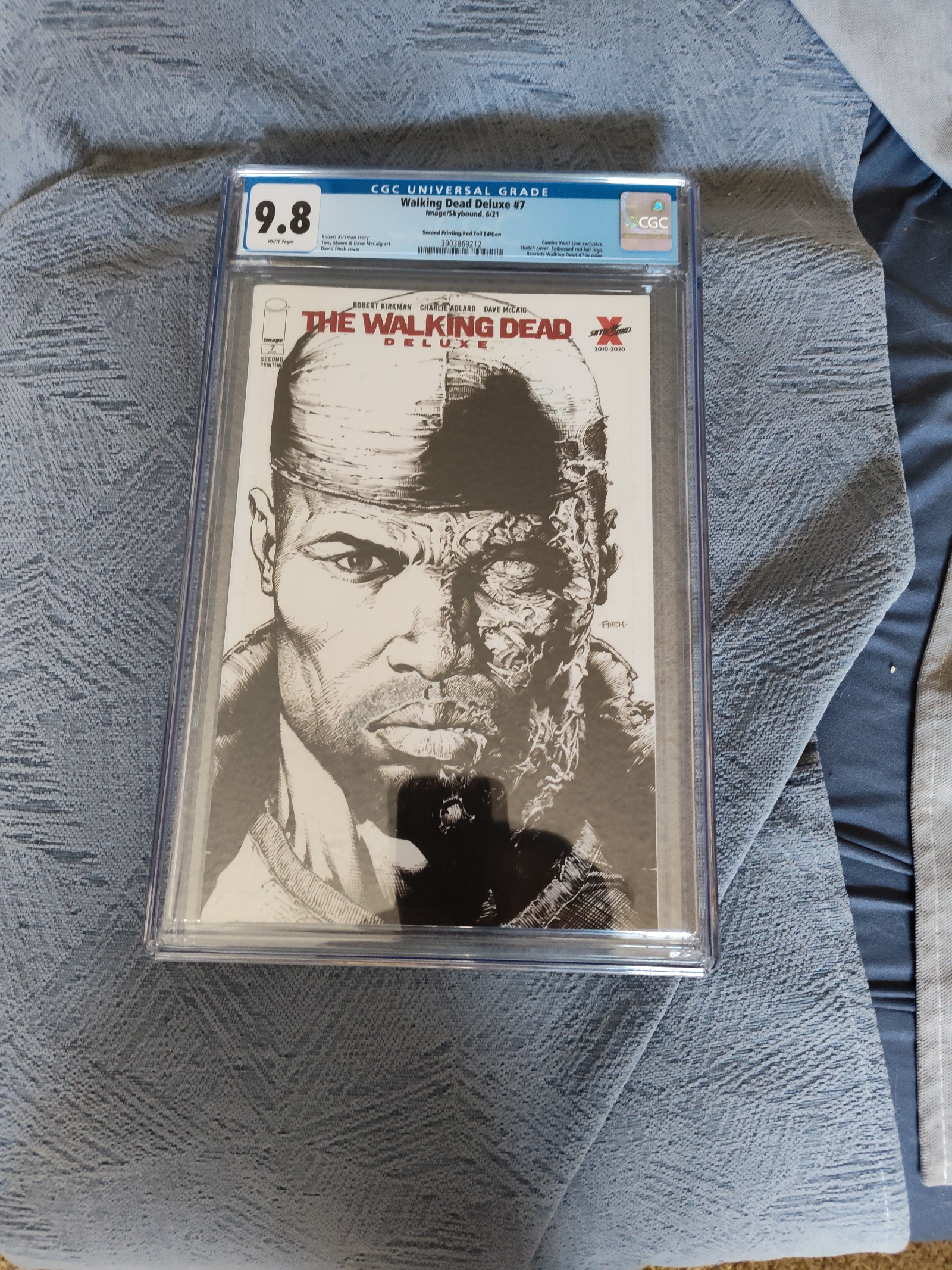 Walking Dead Deluxe Red Foil. CGC 9.8 graded. Black and White cover