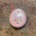 Tamagotchi Connection pastel pink with purple