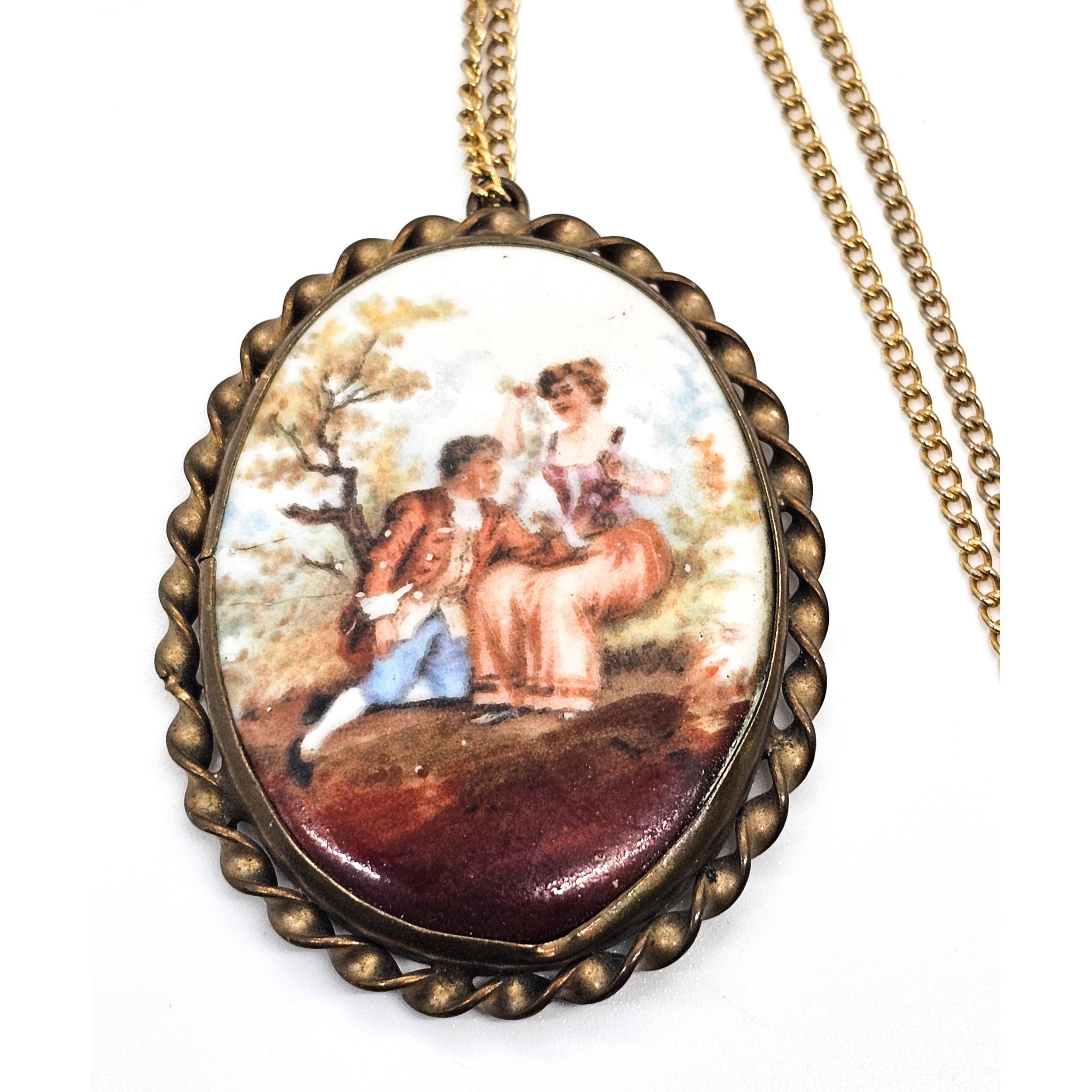 Painted Porcelain Courting Couple painted porcelain antique brass necklace