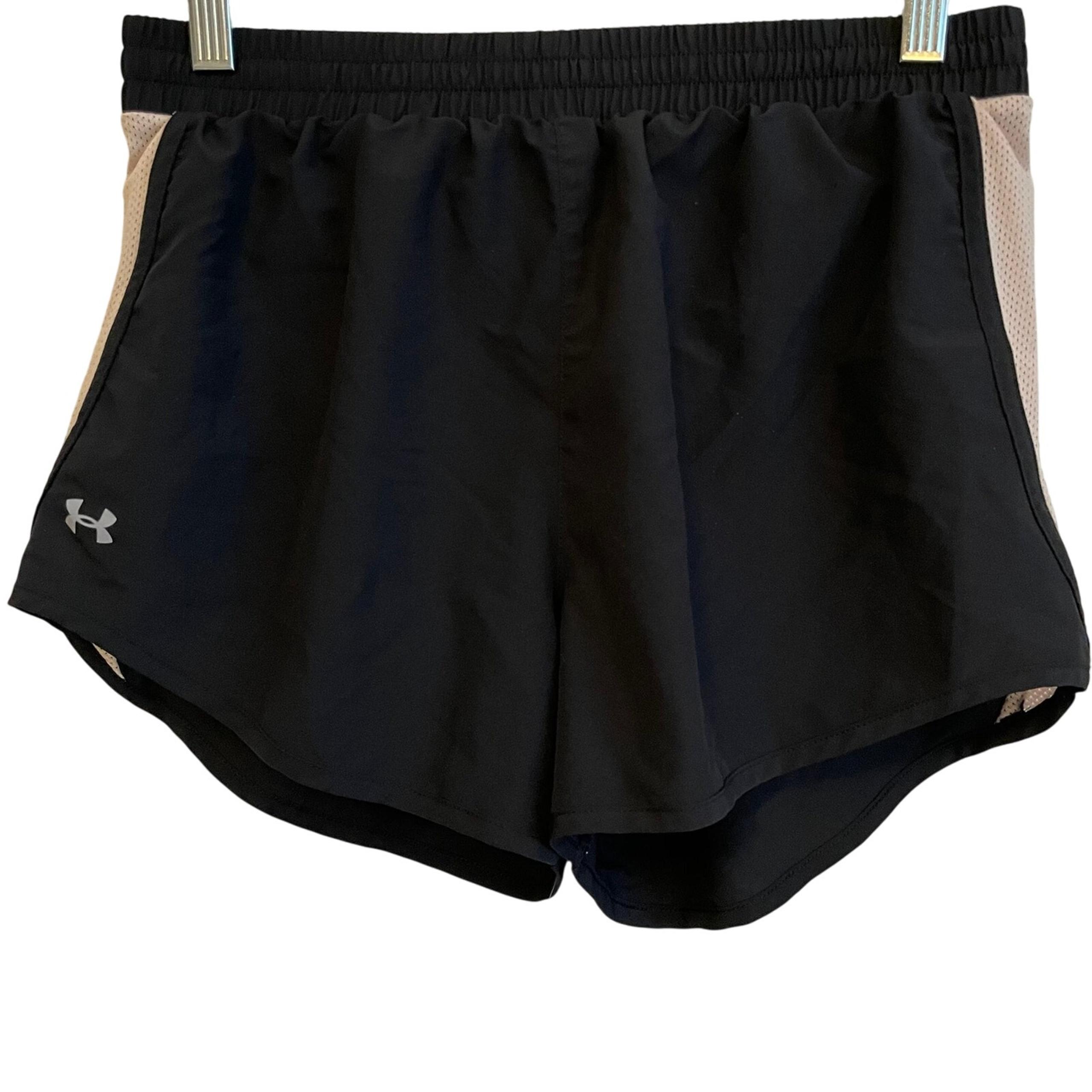 Under Armour women’s athletic shorts in black with lining.