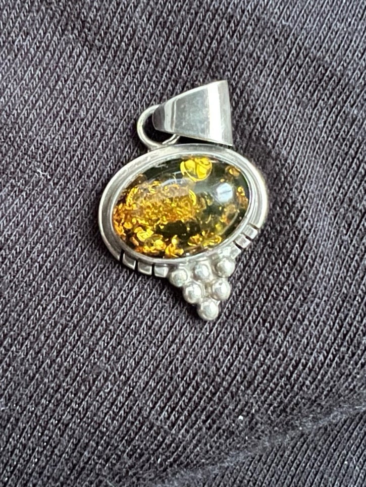 String silver amber pendant