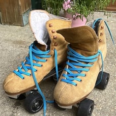 Sure-grip vintage suede roller skates size 6