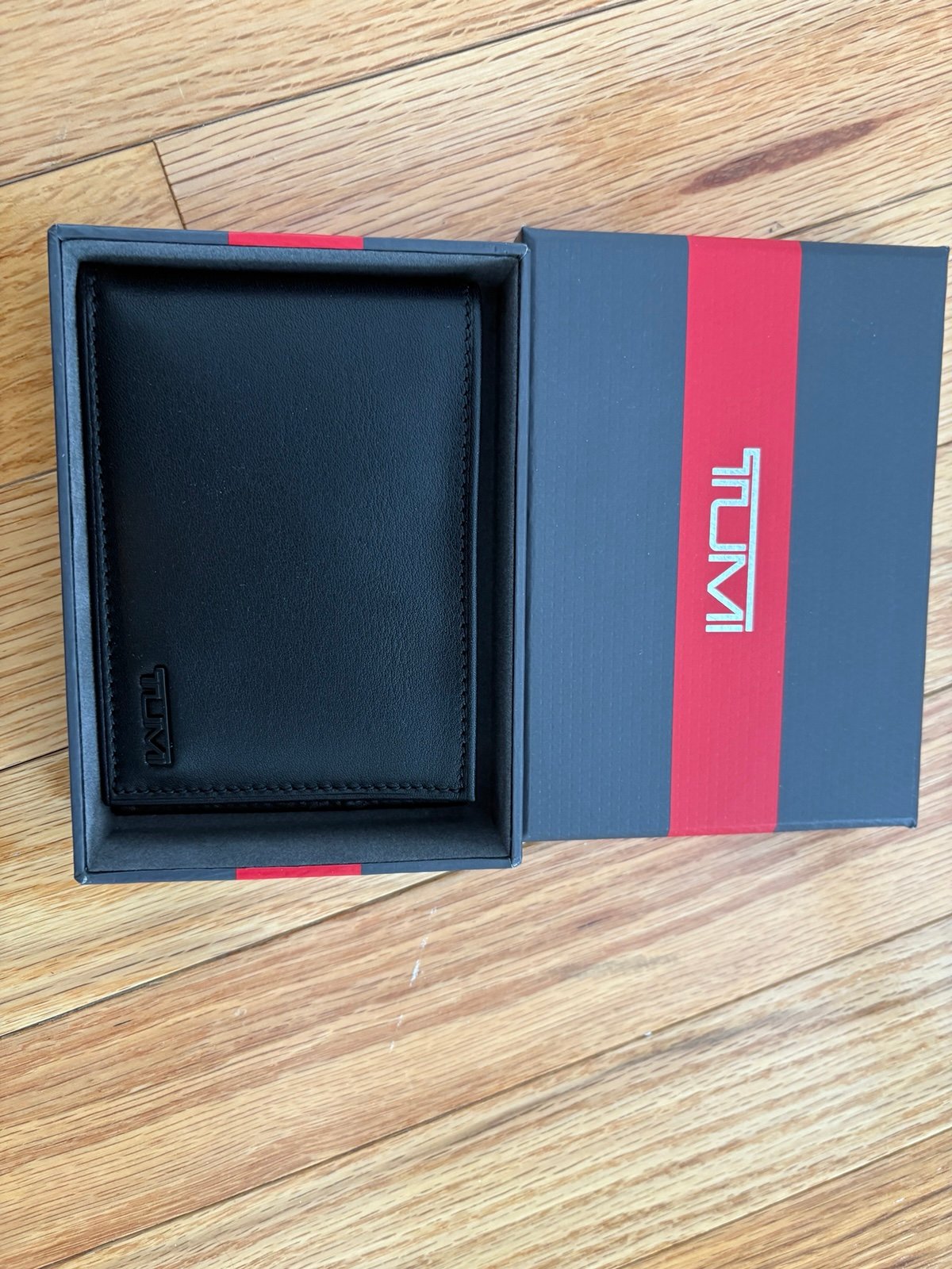 TUMI Delta SLG leather bi-fold wallet