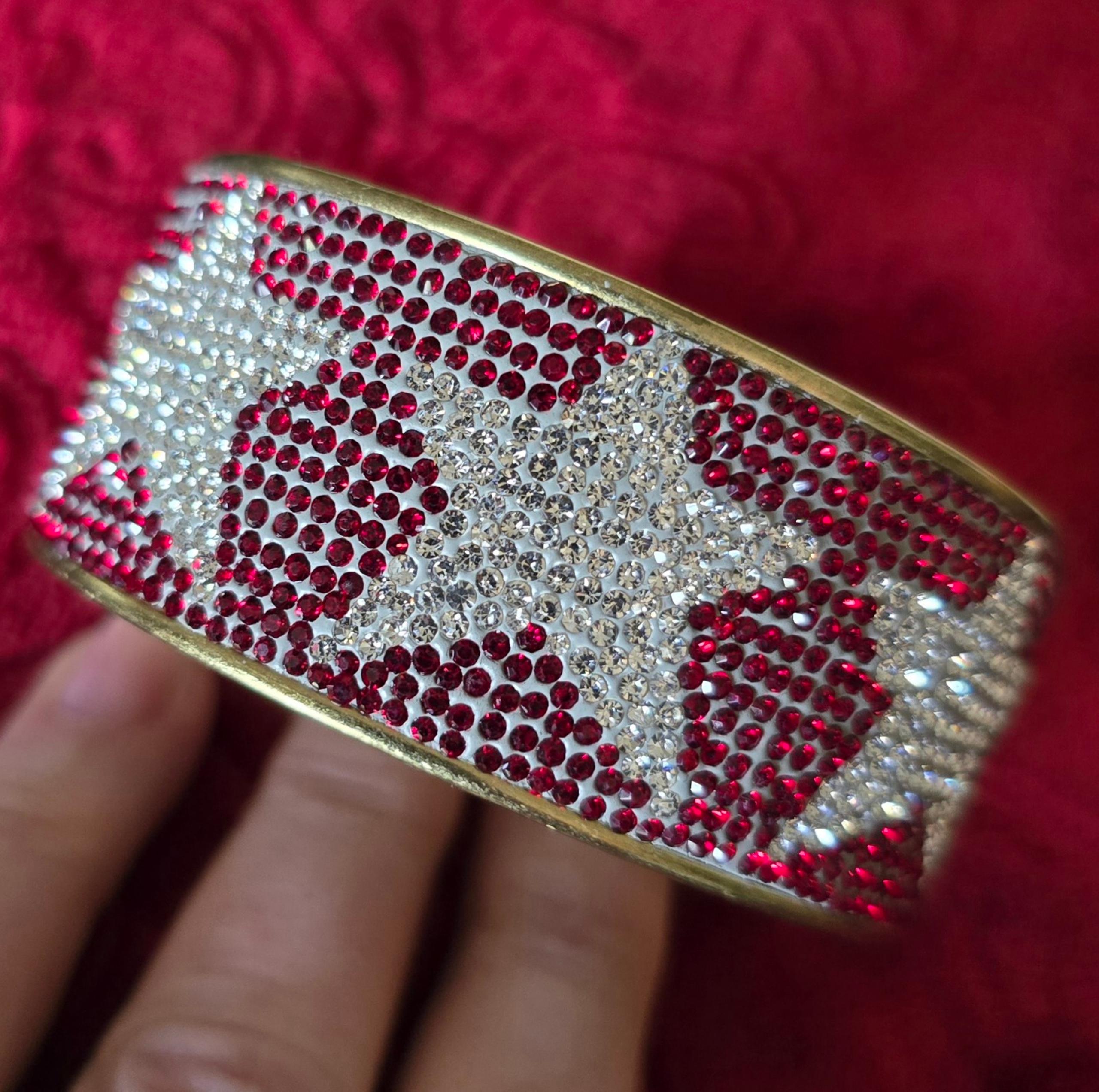 Twiggy London crystals hinged bangle with red and silver star.