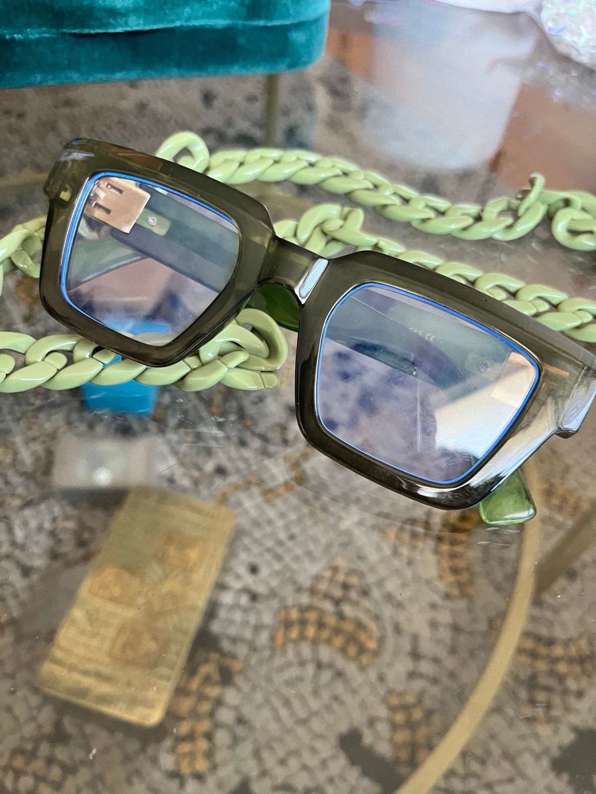 Green eyeglasses with chain