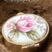 Vintage Gold plating matching gold and floral Hand Mirror and pilbox trinket,