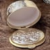 Vintage Gold plating matching gold and floral Hand Mirror and pilbox trinket,
