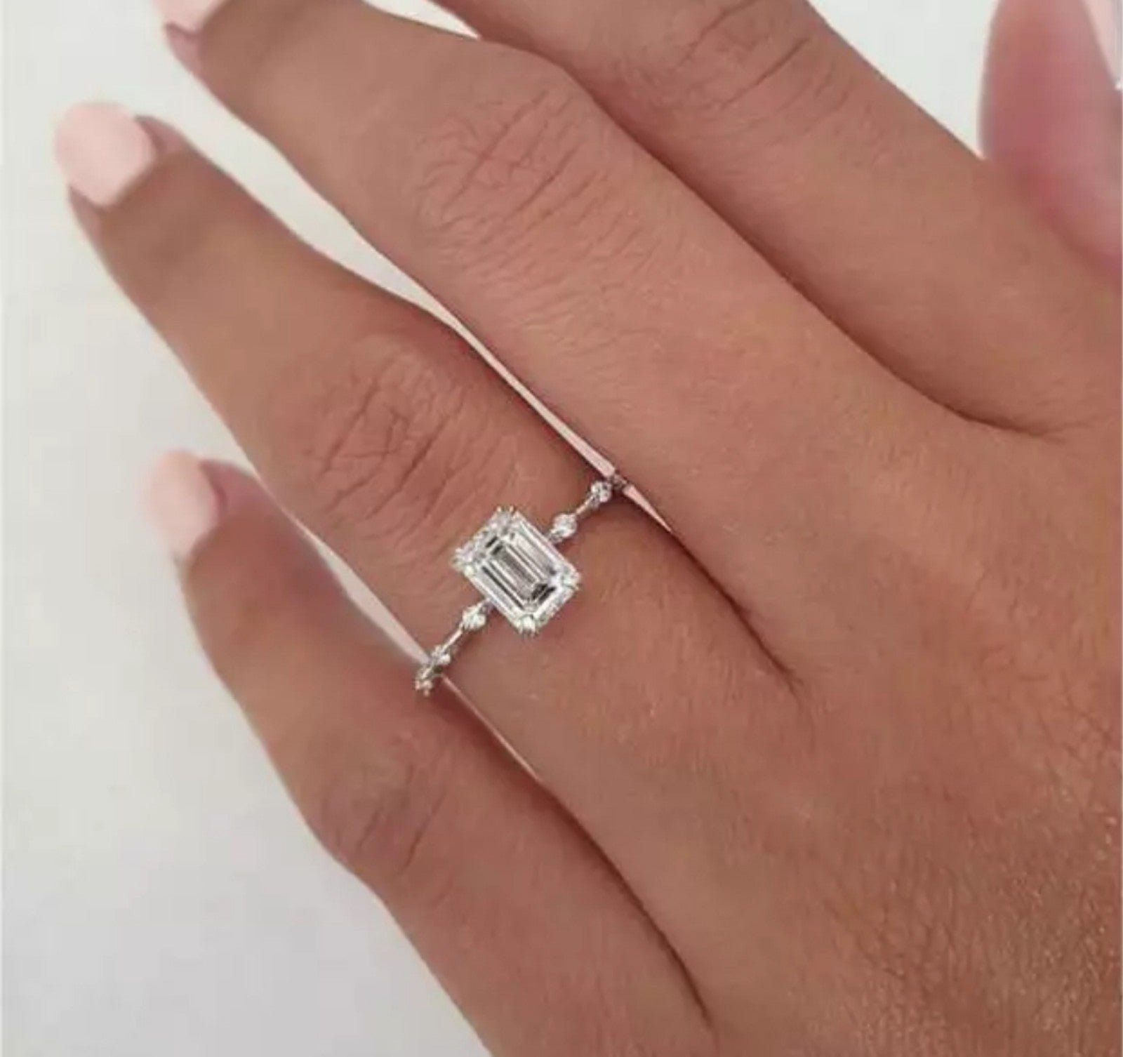 4CT Emerald Cut Sapphire Engagement Ring