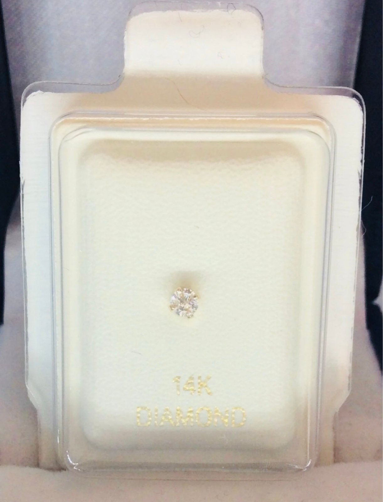 14 K yellow gold genuine round diamond nose bone .05 carats 22 guage