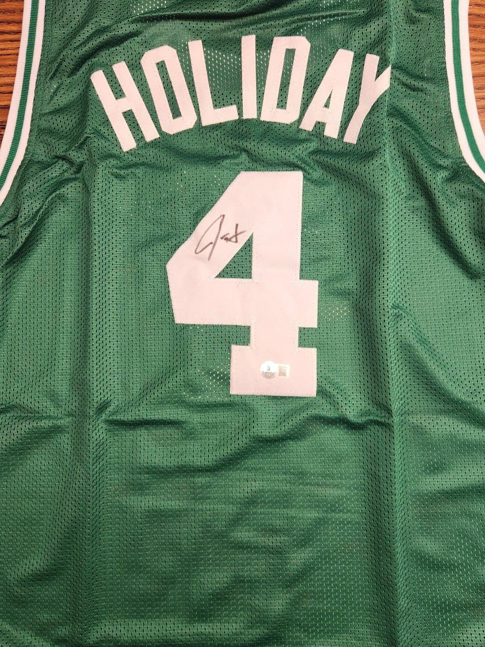 Boston Celtics champion Drue Joliday autographed jersey.
