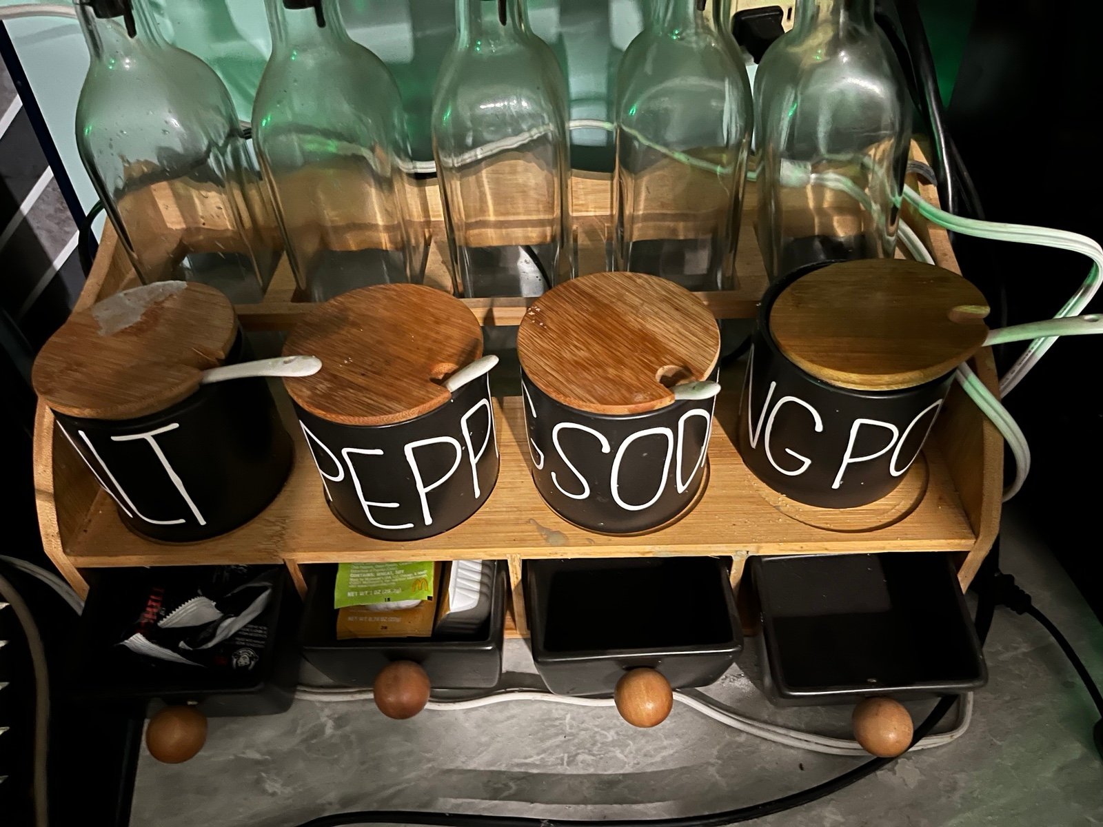 Rae Dunn spice and vinegar jars with rack