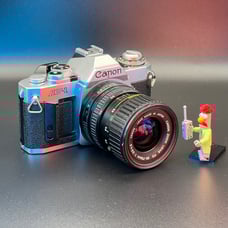 Canon AV-1 35mm film camera body with 35-70mm f/3.5-4.5 zoom lens, tested, works