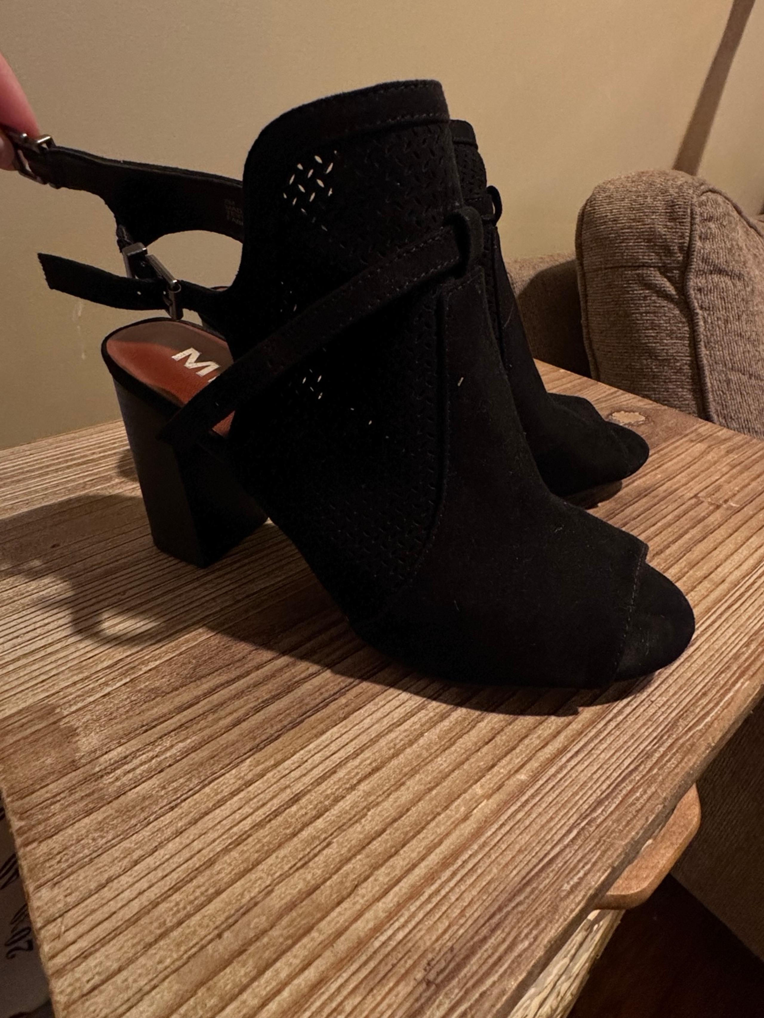 Black suede ankle boots with cut-out details