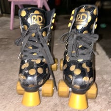 Roller Derby Roller skates black and gold