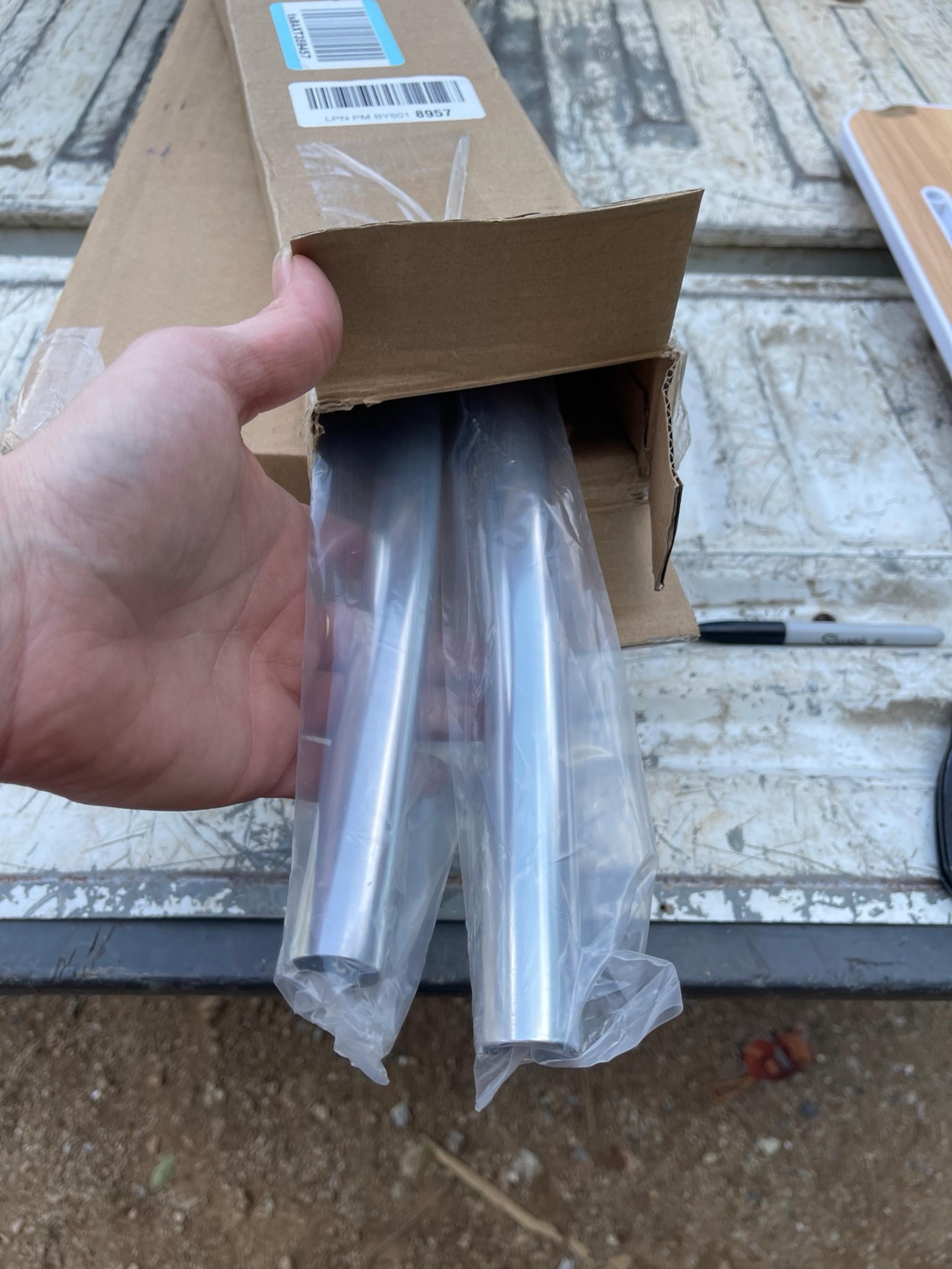 Curved shower rod