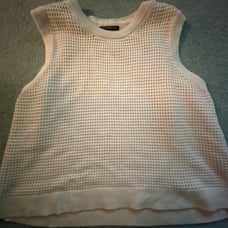 White sweater vest