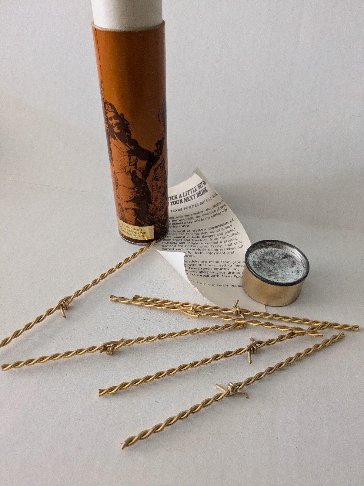 Vintage Texas Purties 24K Gold Plated Stirring Sticks in shotgun shell type can
