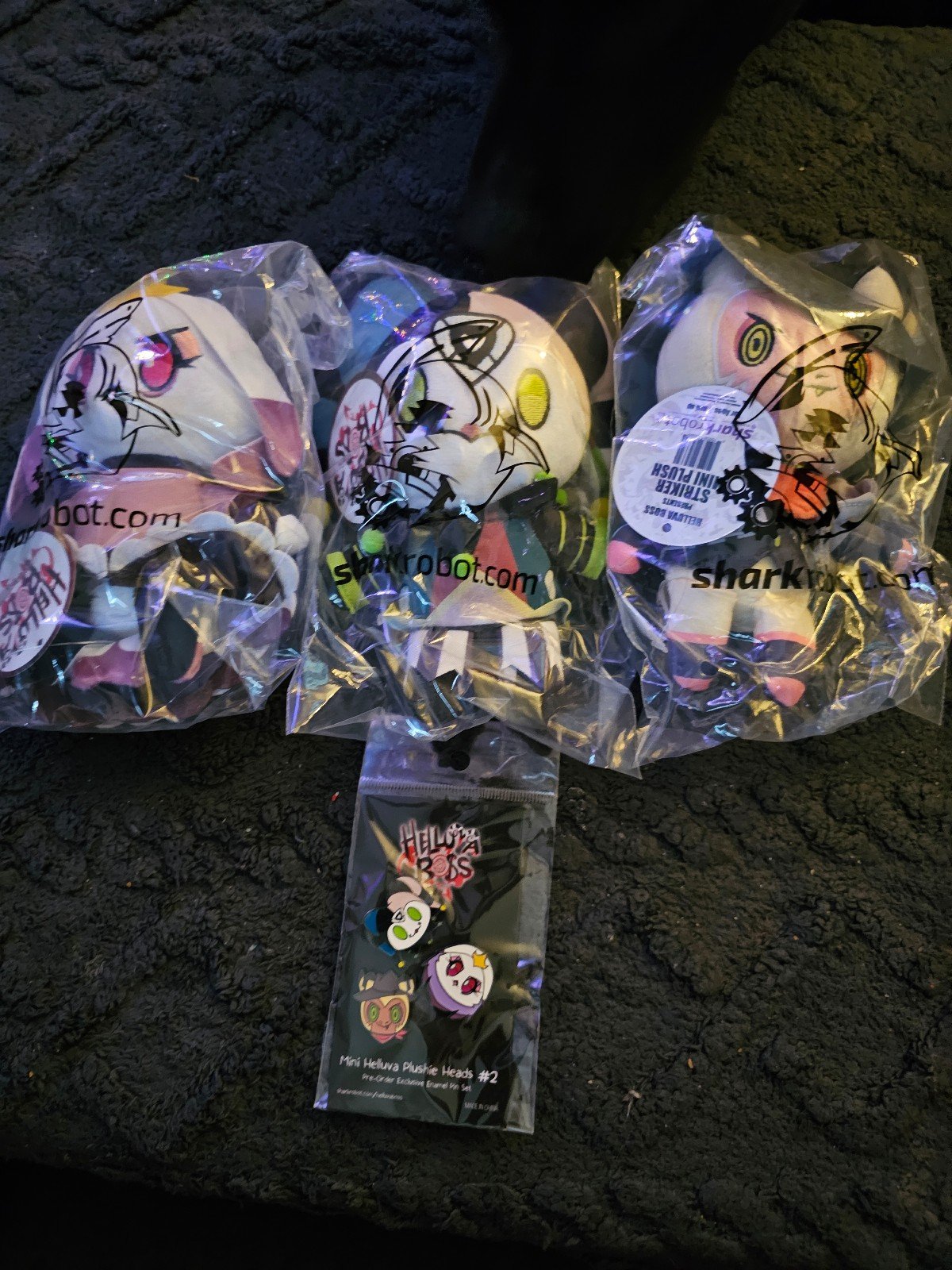 Helluva boss plushies and pins