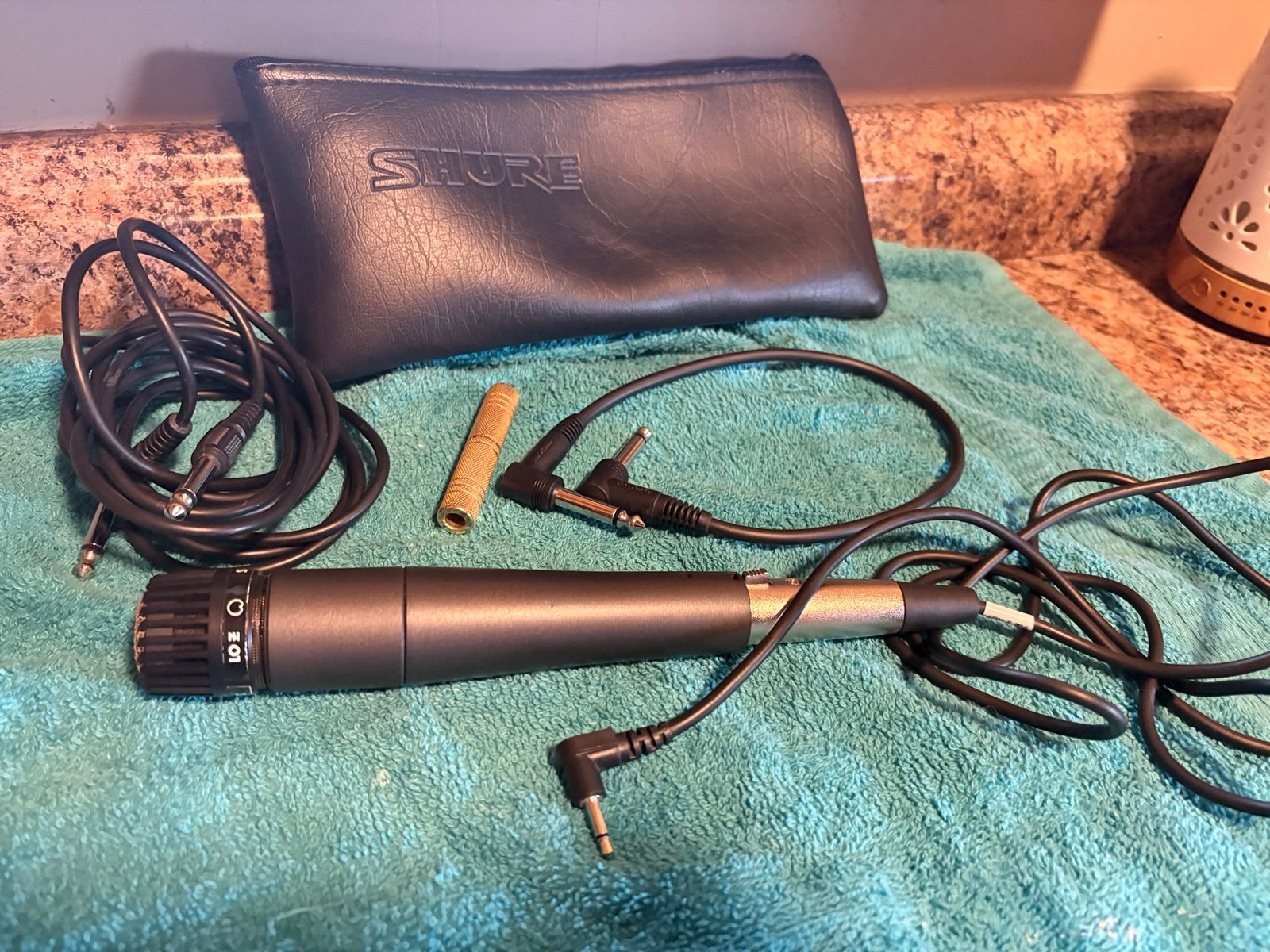 SHURE SM57 MICROPHONE AND MISC CORDS AND CASE