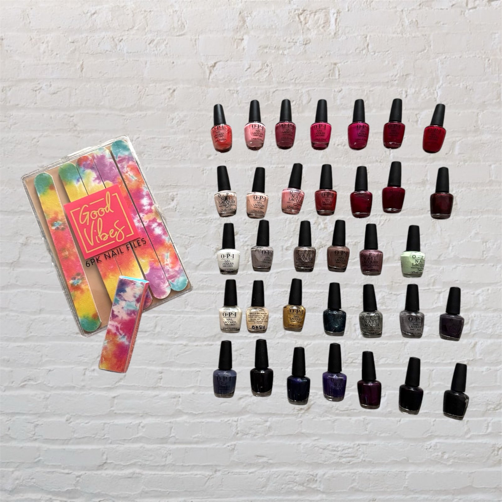 Bundle of 34 mini O.P.I nail polishes, 5 files and nail buff