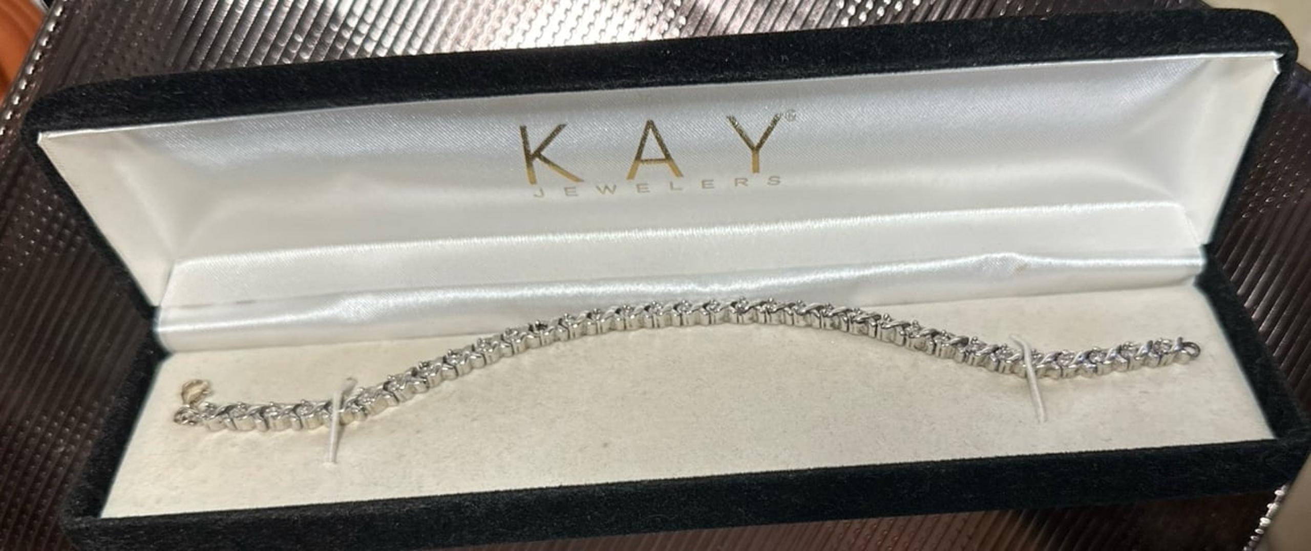 STERLING SILVER 7” DIAMOND BRACELET WITH 33 STONES (KAY JEWELERS