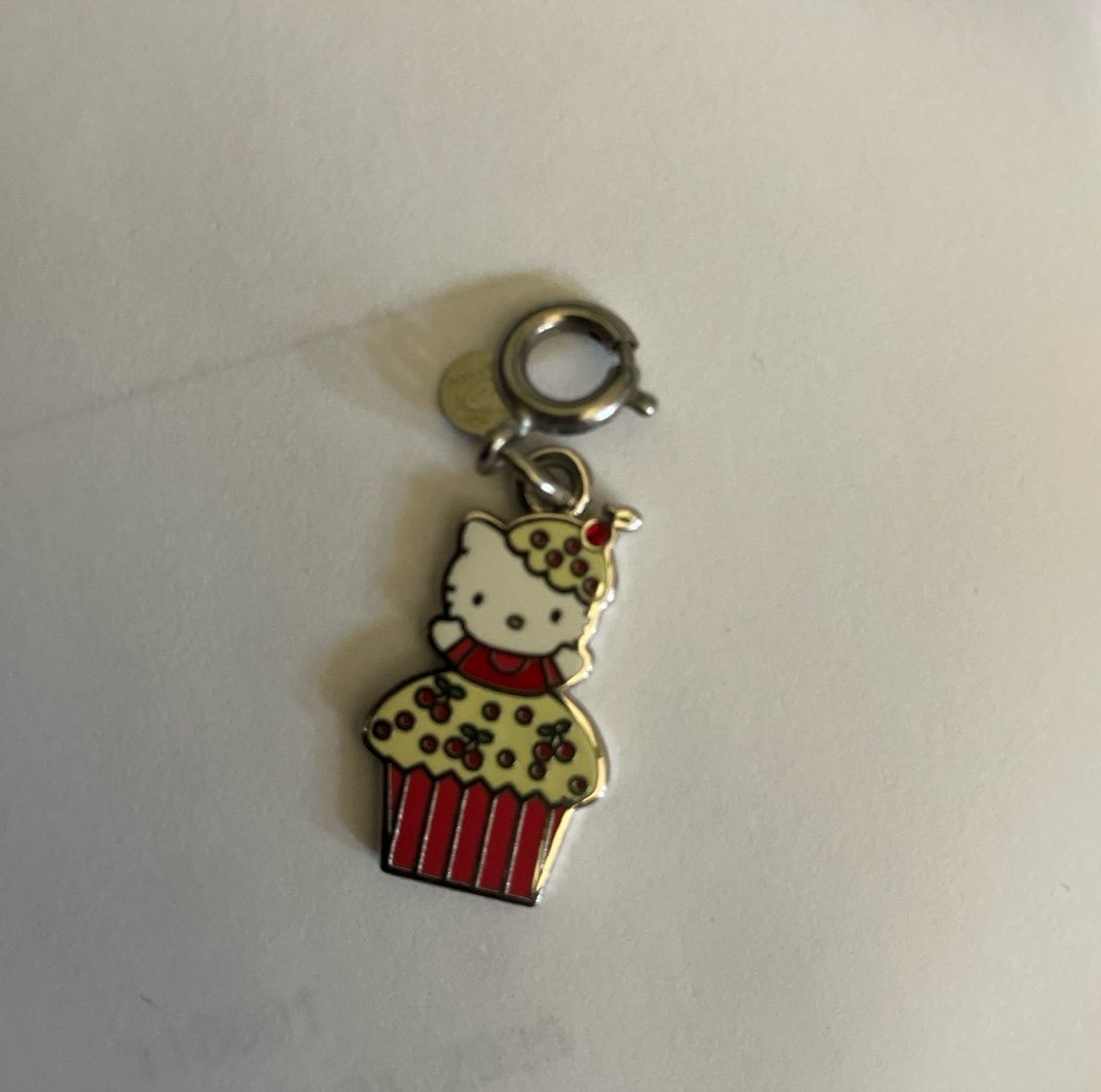 Vintage Hello Kitty jumping out of cupcake charm it! Charm