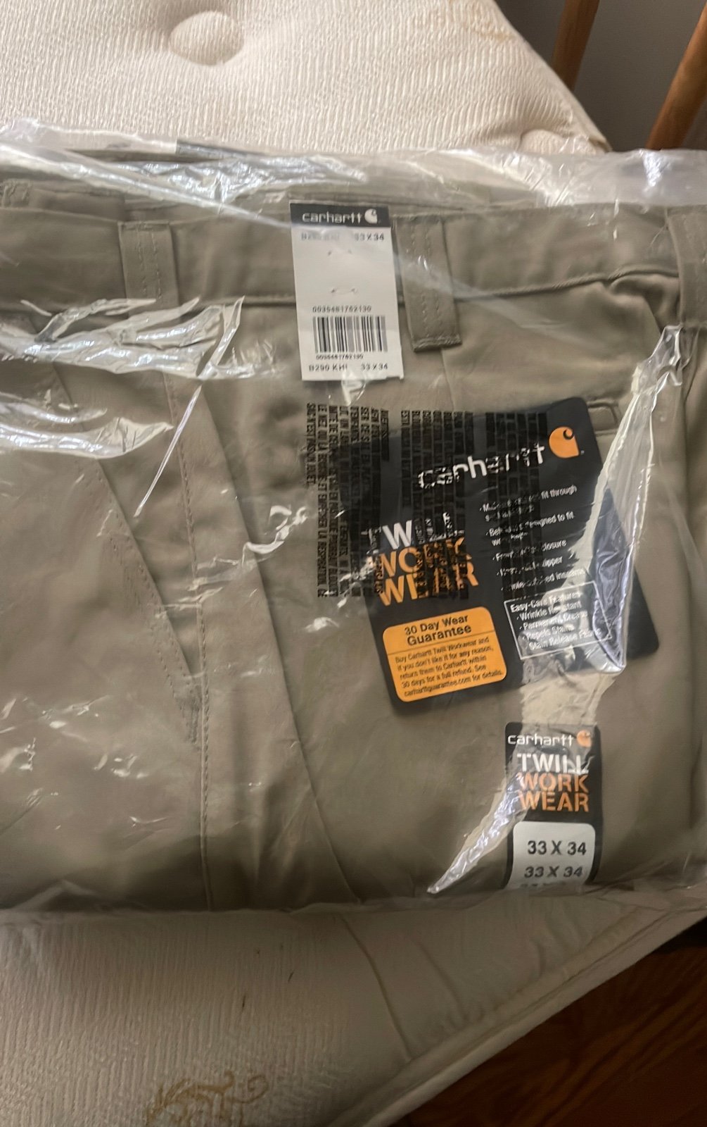 Two pair of carhartt pants 33x34
