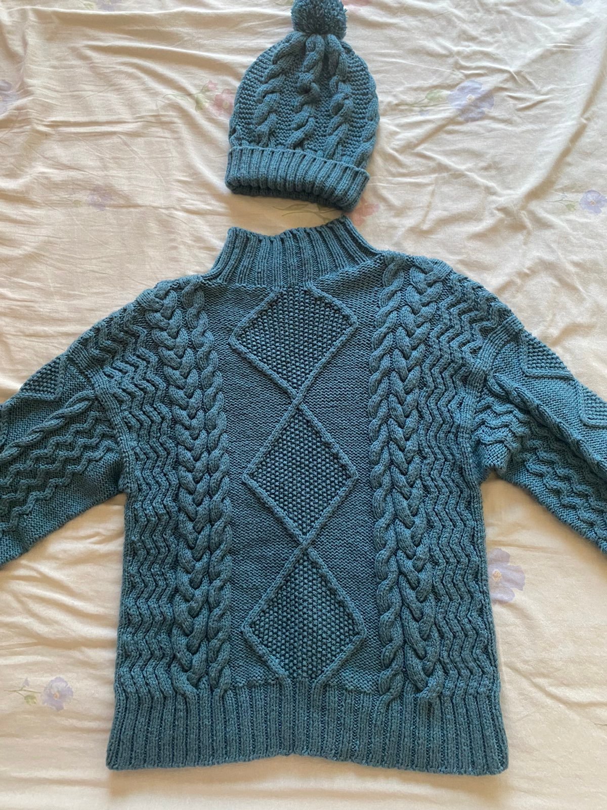 Hand knitted sweater and hat