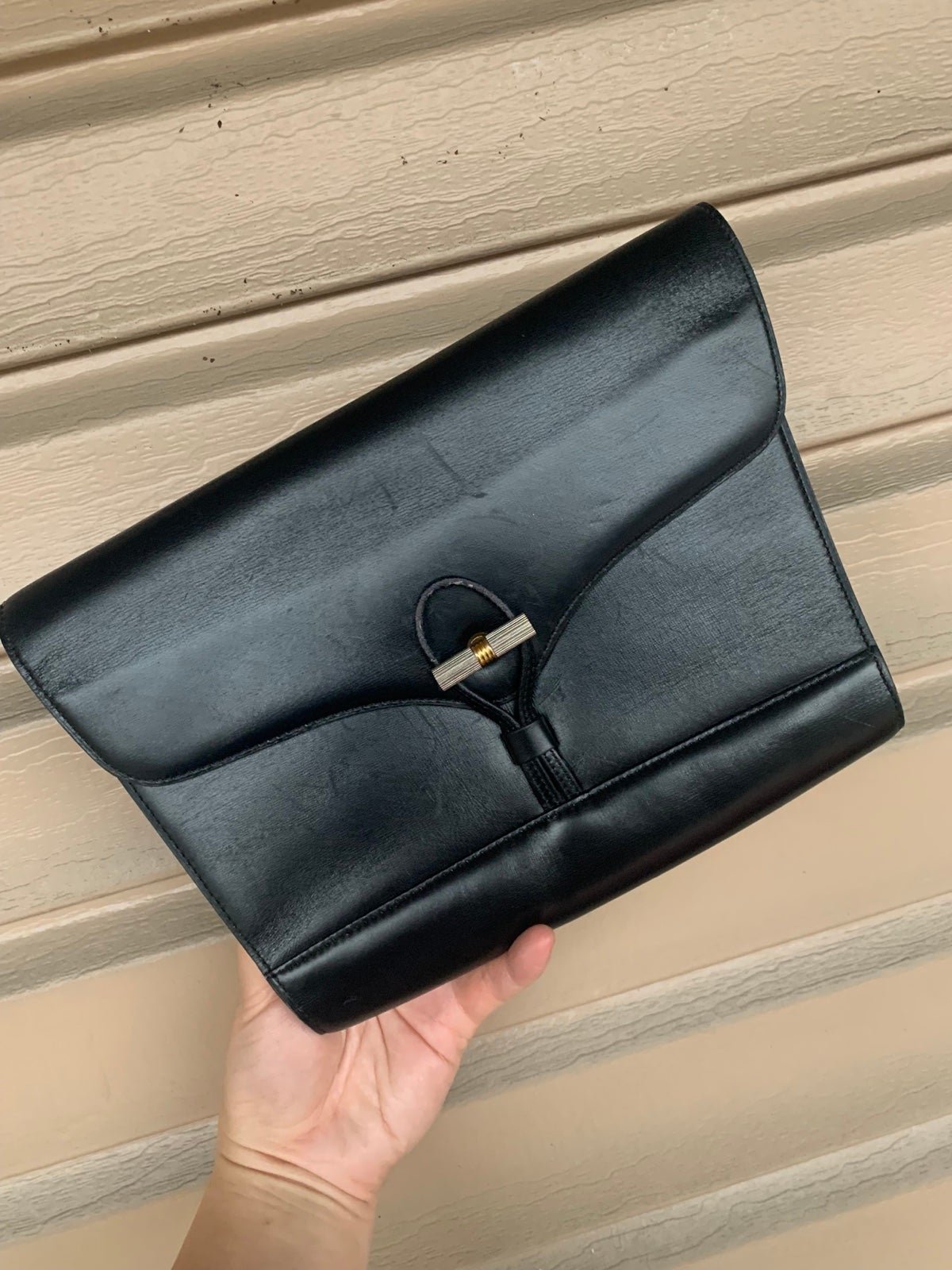 Christian Dior black leather clutch