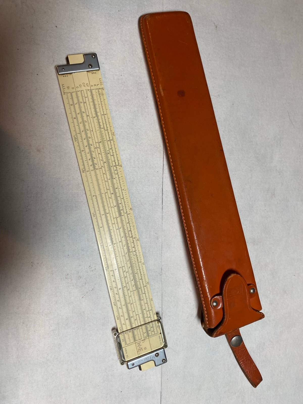 K&E slide rule with leather case patented 1947