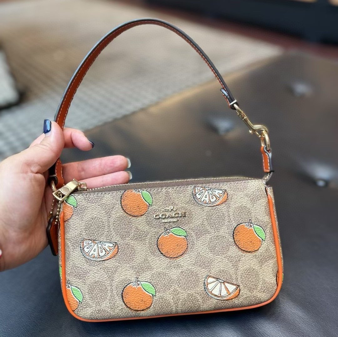 NWT Coach Nolita 19 In Signature Canvas With Orange Print CAL27