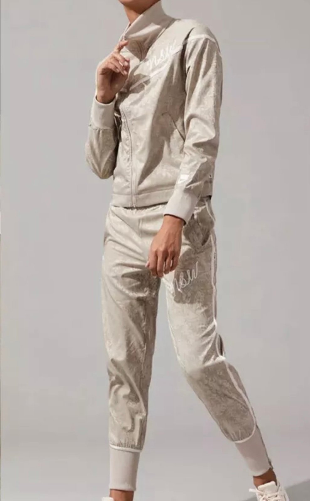 Nike Women’s Sportswear Track LS Jacket and Jogger NSW ChampagneEmbroidered Logo