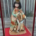 Japanese porcelain doll in glass wooden display vintage