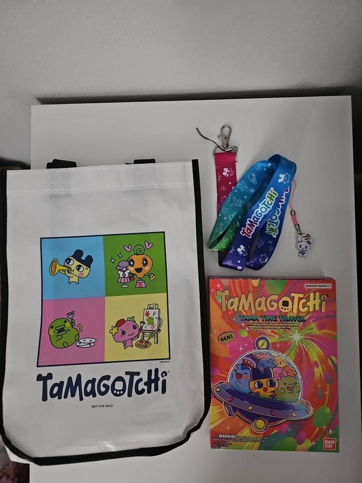 Tamagotchi Tama Time Travel w/lanyard & bag - Gen 1 - SDCC Exclusive