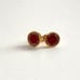Marc Jacobs logo stud earrings.