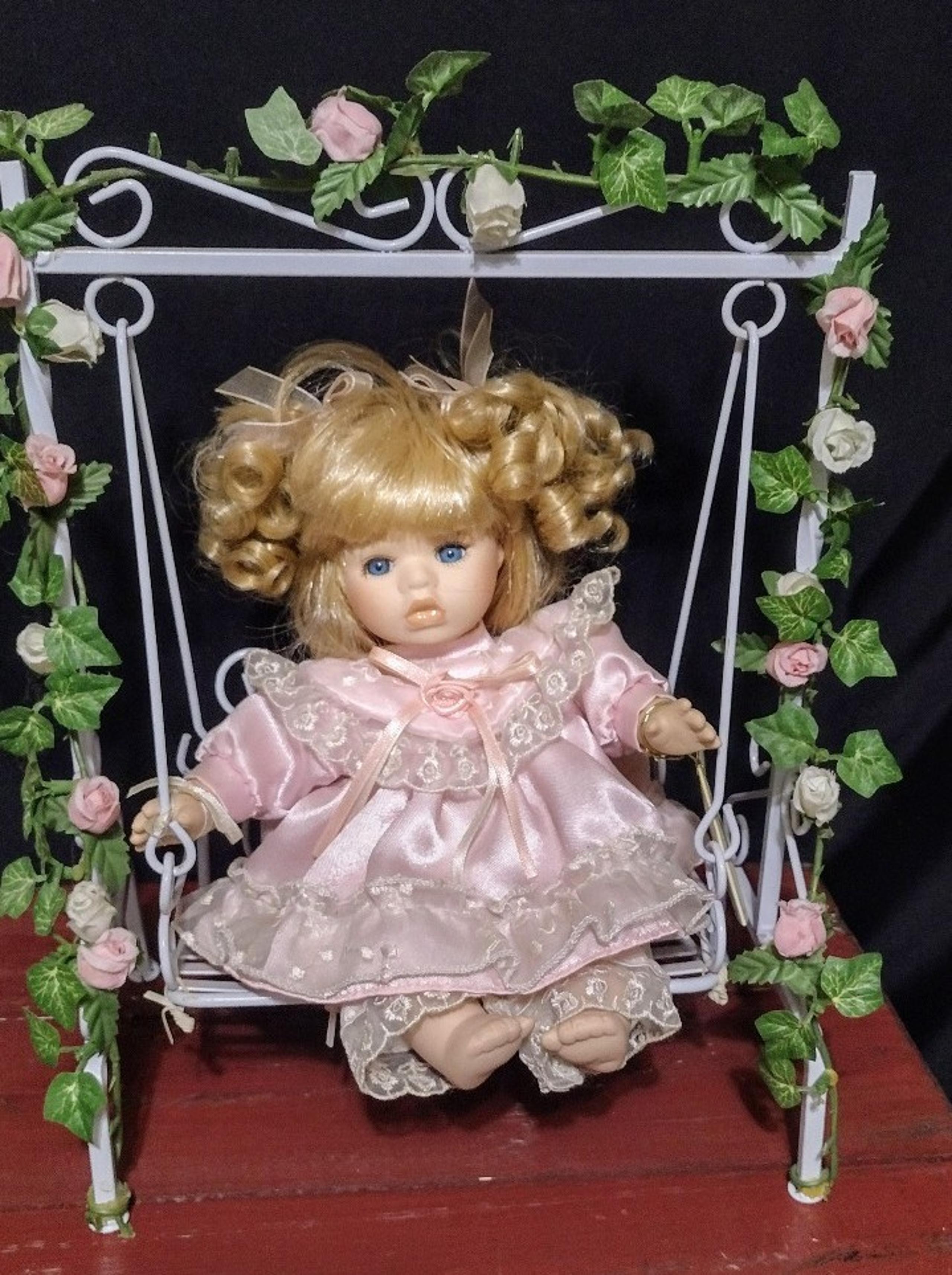 Doll On Swing Vintage