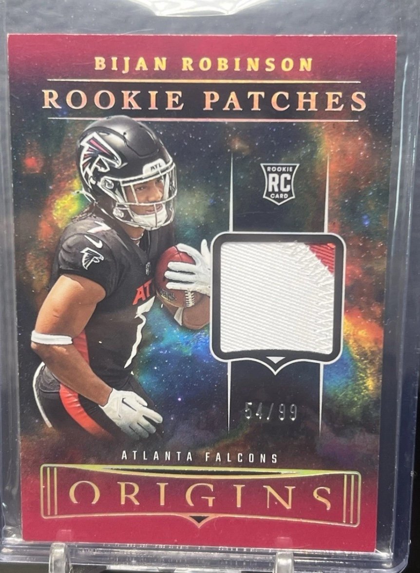 2023 Panini Origins - Rookie Patches Red #RP-BR Bijan Robinson /99 ( RC)
